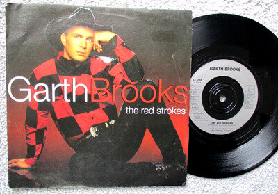 Garth Brooks - The Red Strokes 7" Single Vinyl is NEAR MINT.