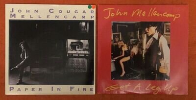 2 x John Mellencamp 7”s- Paper In Fire & Get A Leg Up- Mercury Records 7”