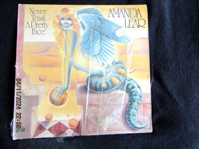 AMANDA LEAR 'NEVER TRUST A PRETTY FACE' 1979 12" VINYL IN VGC PLAYED &TESTED