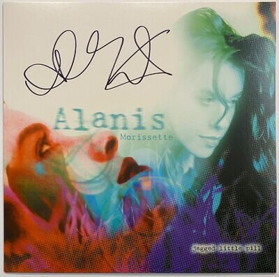 ALANIS MORISSETTE HAND SIGNED JAGGED LITTLE PILL VINYL - IRONIC - VERY RARE.