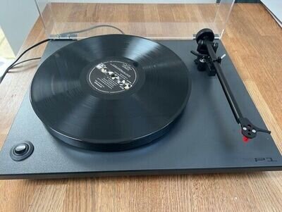 Rega RP1 Turntable in Cool Grey. Excellent condition with performance pack.