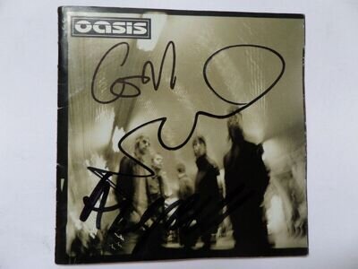 OASIS AUTOGRAPHED CD BOOKLET, SIGNED BY NOEL, LIAM, GEM, ALAN, ANDY. 10 SIGS.