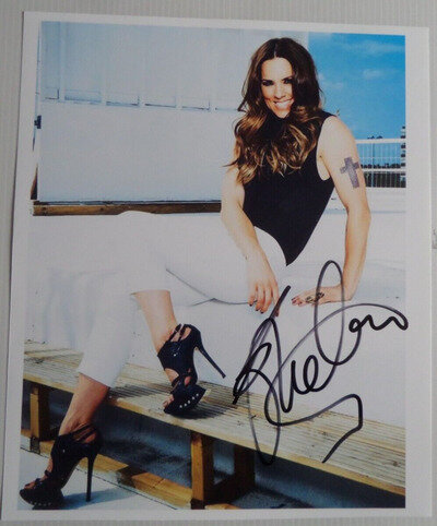 MELANIE CHISHOLM THE SPICE GIRLS, AUTOGRAPHED 10 X 8 PHOTOGRAPH.