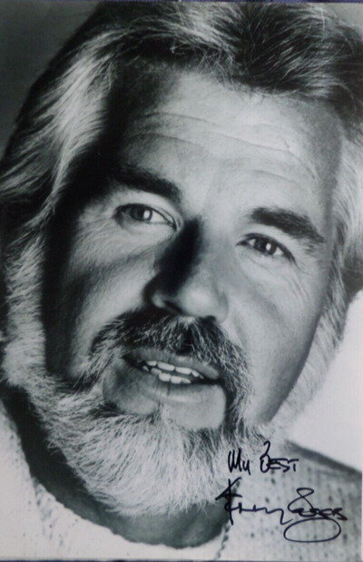 KENNY ROGERS, AUTOGRAPHED A4 PHOTOGRAPH.