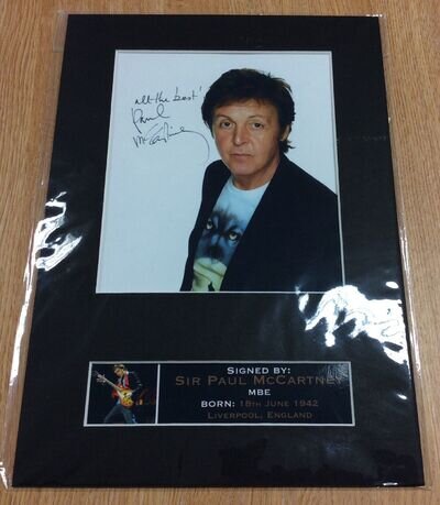 Autographed Photograph Of Paul McCartney With COA And Set Of Beatle Dollars