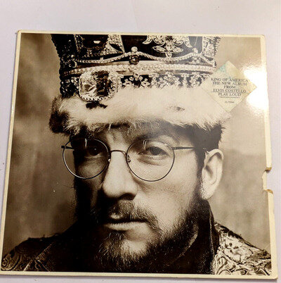 Elvis Costello King Of America Lp FBeat 1986 (damaged sleeve G+) Record VG+