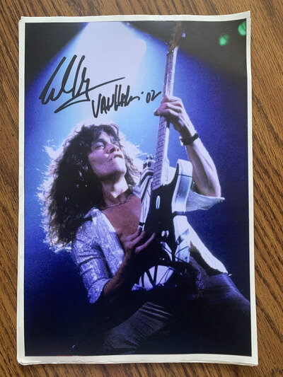 Full Color Photo of Eddie Van Halen Playing a Concert with his Black Autograph