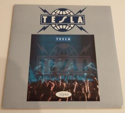 TESLA - SIGNS/ DOWN FOR BOOGIE VINYL 45 RPM. PLAYS EXCELLENT.