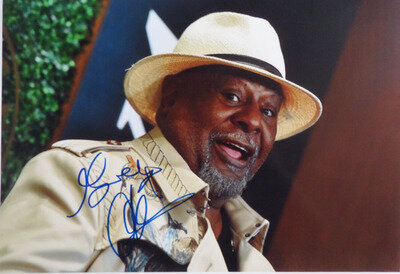 GEORGE CLINTON AUTOGRAPHED A4 PHOTOGRAPH.