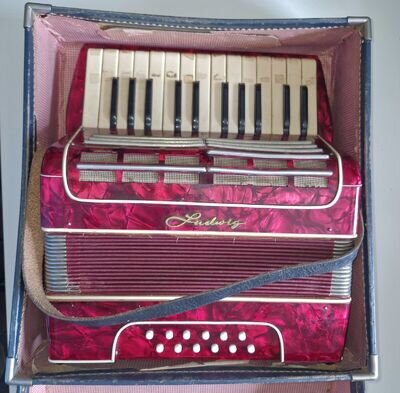 Ludwig Accordion In Case. Needs Some Attention.