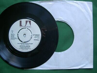 CRYSTAL GAYLE - TALKING IN YOUR SLEEP. 7" SINGLE. (UNPLAYED U.K. STEREO SINGLE)