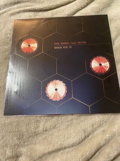 DUMB NUMBERS AND MELVINS - BROKEN PIPE EP OXBLOOD SAWBLADE VINYL no 467/525