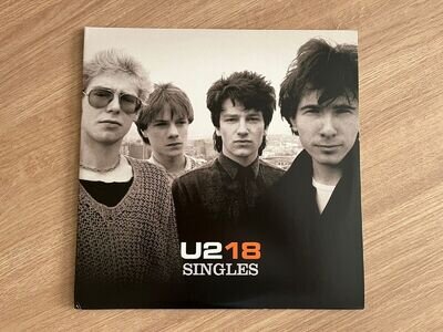 LOOK NOW - U2 - 18 - THE SINGLES (PLAYED ONCE)