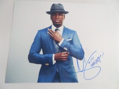 NE-YO AUTOGRAPHED 10 X 8 PHOTOGRAPH.