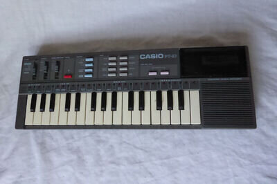 Vintage 1987 Casio CASIOTONE PT-87 MINI KEYBOARD & ROM No Battery Cover Working