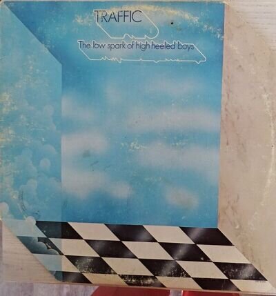 12" VINYL ALBUM - TRAFFIC - "THE LOW SPEED OF HIGH HEELED BOYS" (STEVE WINWOOD)