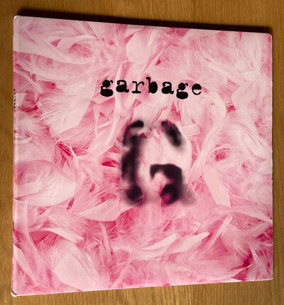 Garbage by Garbage Remastered 20th Anniversary Edition Transparent Pink Vinyl.